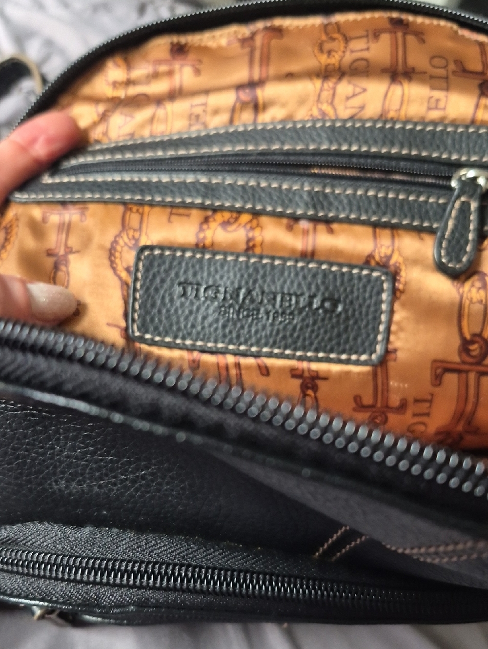 Tignanello Black Pebbled Leather Back Pack with Gold Printed Lining